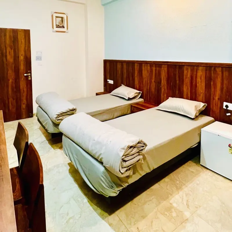 Comfortable beds with premium linen at Karol's Villa Girls PG, Malviya Nagar